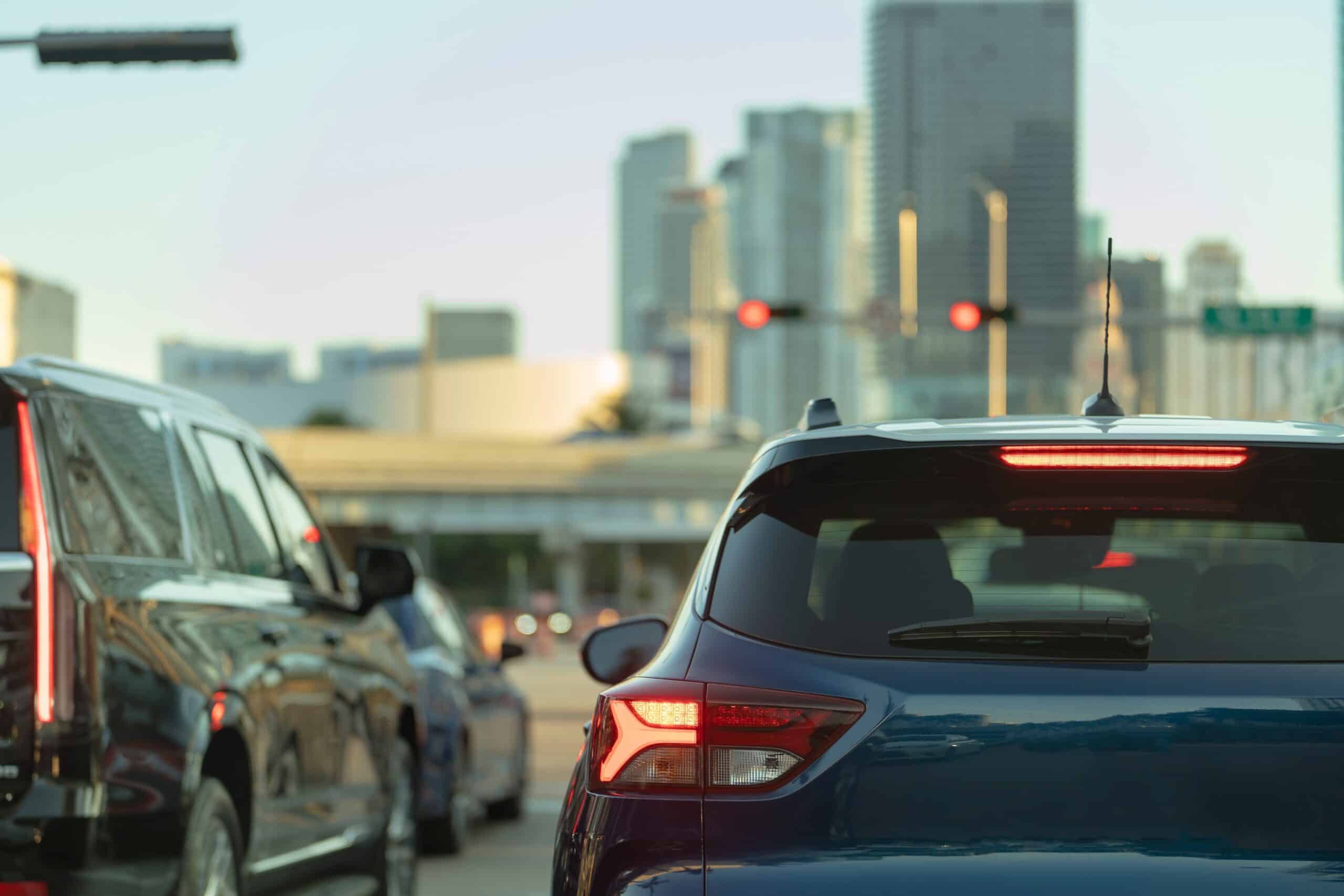 Cars stopped in heavy traffic at an intersection in the city