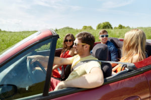 Group of teenagers in a car