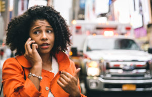 woman-on the phone after an accident