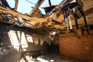 a house with fire and smoke damage