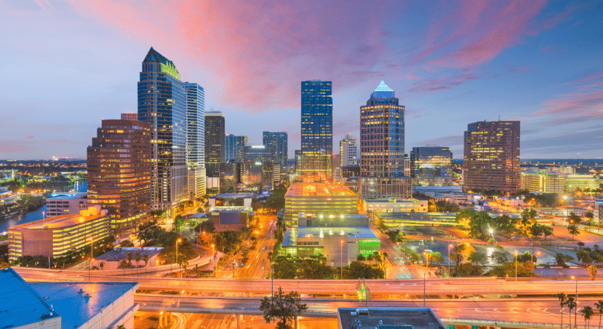 Tampa skyline reflected over the water at dusk