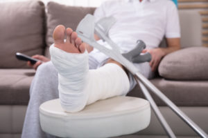 injured man resting at home