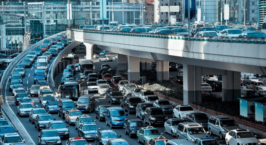 Congested multi-level highway interchange packed with cars