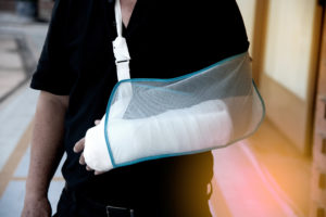 man with a broken arm from a work injury