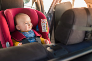 child in a car seat