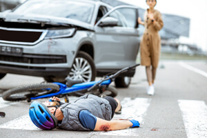 It is unclear who had the right of way in this accident between a car and a bicycle. 