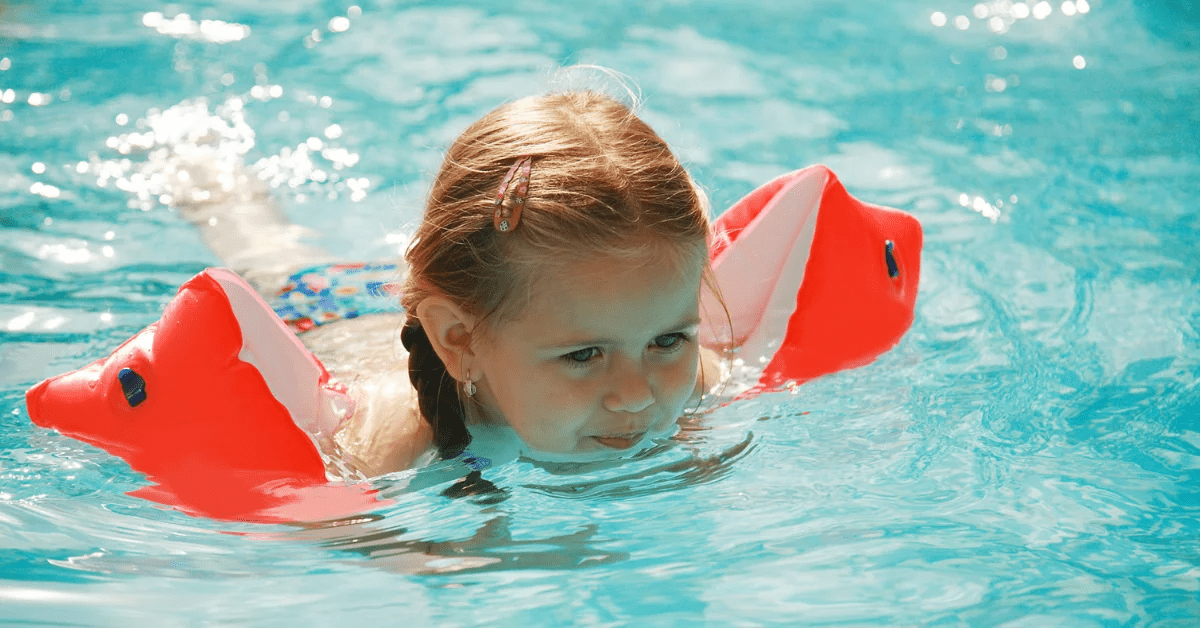 Girl swimming in a pool