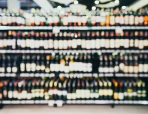 shelves of bottles in a liquor store