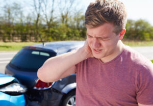 Man has sore neck after a car crash