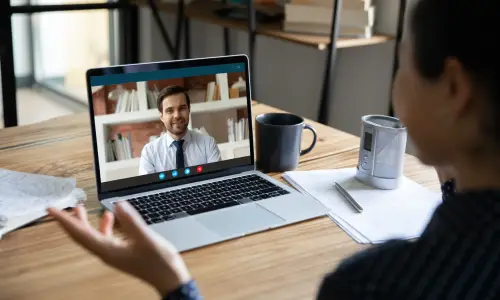 Family member of an injured victim is having a consultation meeting with a Citrus Park truck accident lawyer through an online platform.