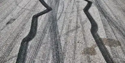 Skid marks on pavement with $21,600,000 reckless driver verdict