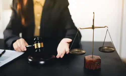 A Tampa construction accident lawyer expalining case details to a client who is out of view